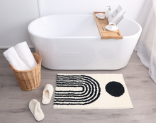 Load image into Gallery viewer, Black &amp; White Ivory Abstract Bath Mat – Non-Slip Washable Boho Rug
