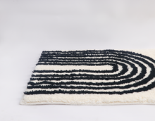 Load image into Gallery viewer, Black &amp; White Ivory Abstract Bath Mat – Non-Slip Washable Boho Rug
